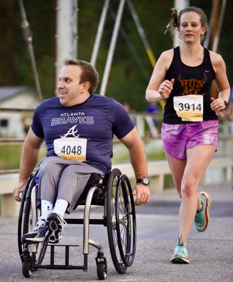 A photo of Sara Thane Milam and her husband running.